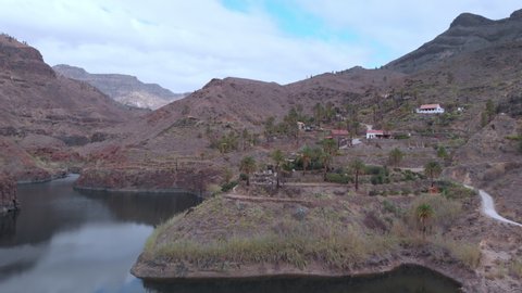 Beautiful lake ayagaures of gran canaria in Spain. Landscape with lake, mountains and overcast sky
