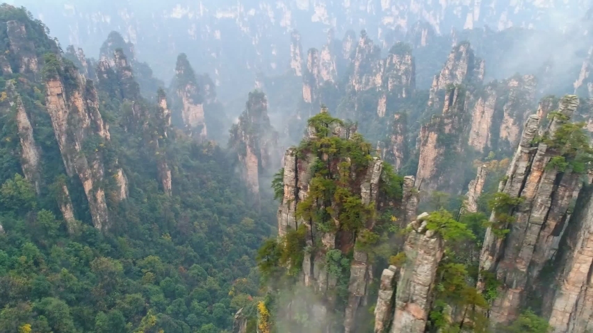 Misty steep mountains in Zhangjiajie Sandstone Forest Geopark, China