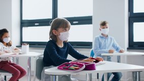 Group of children with face mask back at school after covid-19 quarantine and lockdown. - Powered by Shutterstock - Get 15% off with code: PIKWIZARD15