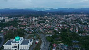 Aerial Footage of Beautiful Twilight sunset in Kota Kinabalu, Sabah, Malaysia during lockdown because of Coronavirus pandemic. Empty roads, no traffic. 4k