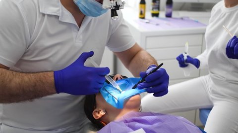Dentist is treated for teeth at a dental clinic