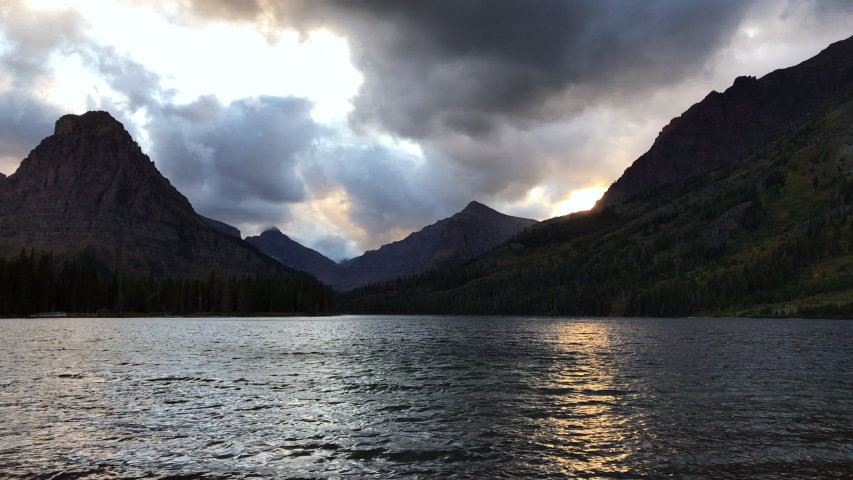 Mountain landscape seen from lake in Glacier National Park. Montana