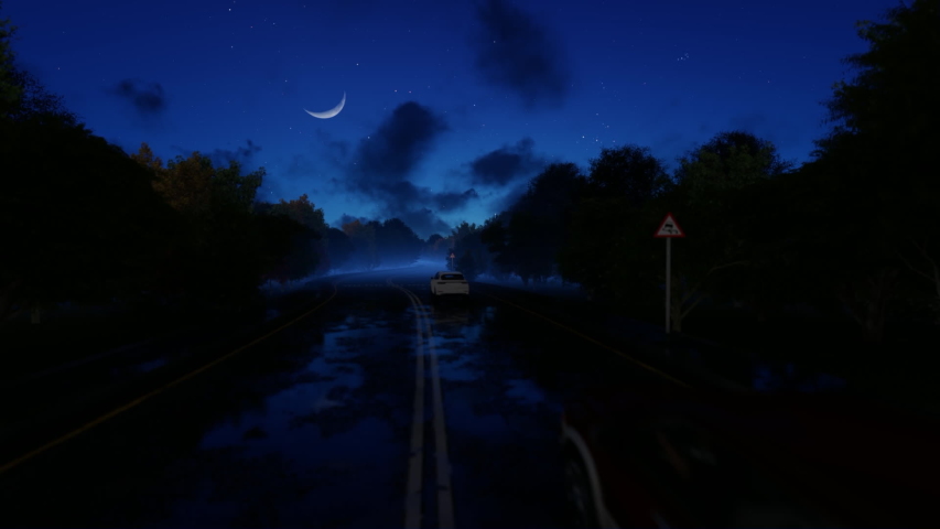 Cars slowly passing by, dangerous slippery road,traffic at nighttime