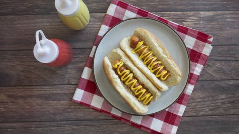 Stop Motion Animation of Two Hot Dogs Being Eaten