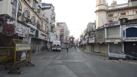 MUMBAI/INDIA - MAY 17, 2020 : Closed shops in a market area at Sheikh Memon Street, Kalbadevi during a nationwide lockdown.
