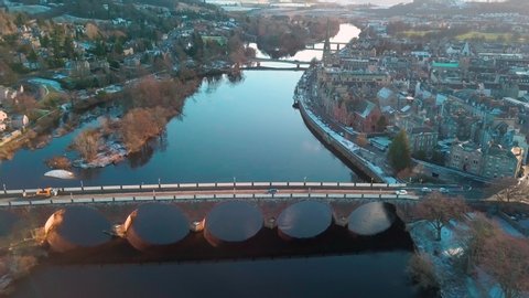 Dolly in aerial shot of the city of Perth in Scotland with a bit of snow. 4K video quality pt.2