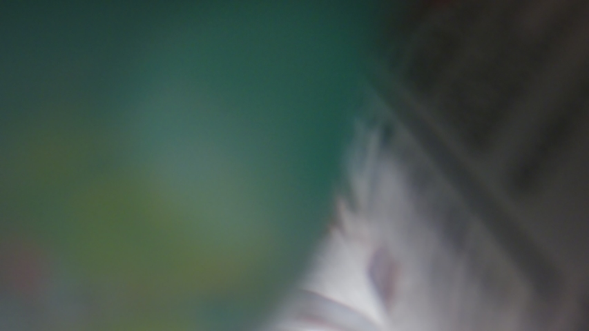 Shot from inside of shopping bag of man with face mask, taking groceries out