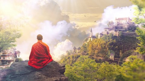 A person or monk sitting on hill/mountain and meditating in serene nature as birds and clouds fly by