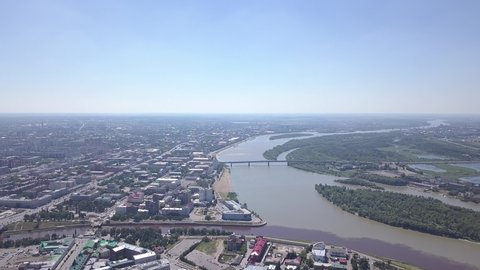 D-Cinelike. The merger of the Irtysh and Om rivers, panoramic views of the city. Omsk, Russia, Aerial View