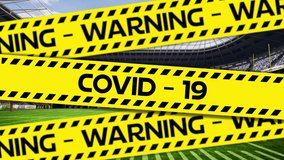 Animation of the words Warning Covid-19 written in black letters on yellow and black tape with coronavirus Covid-19 spreading over a rugby stadium in the background. - Powered by Shutterstock - Get 15% off with code: PIKWIZARD15