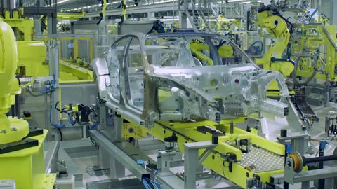 Munich / Germany 9.3.2018﻿         footage of assembly line in Mercedes Benz , a  car factory  , taken by handheld camera