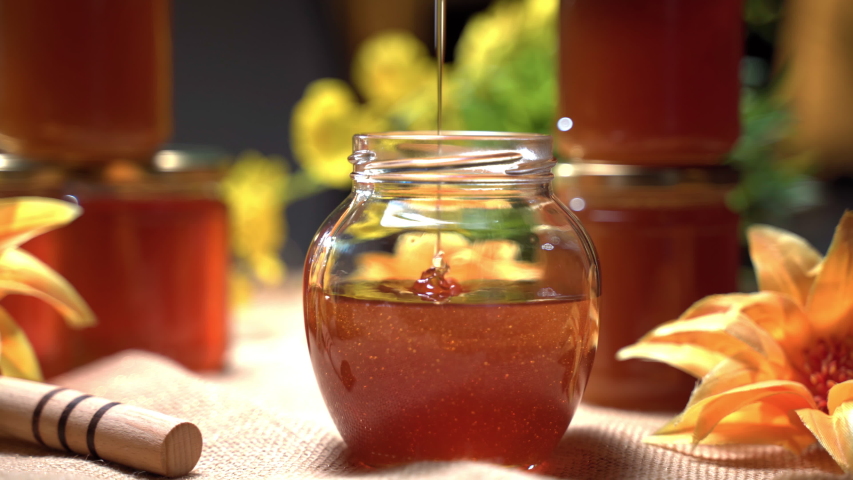 pouring-honey-on-spoon-and-bowl-image-free-stock-photo-public