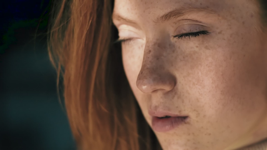Close up of Woman’s Face, Girl opening her Beautiful green Eyes, Attractive Ginger. Natural Beauty with Freckles. Gorgeous woman with long Eyelashes and Attractive Appearance. Slow motion. Royalty-Free Stock Footage #1053673967