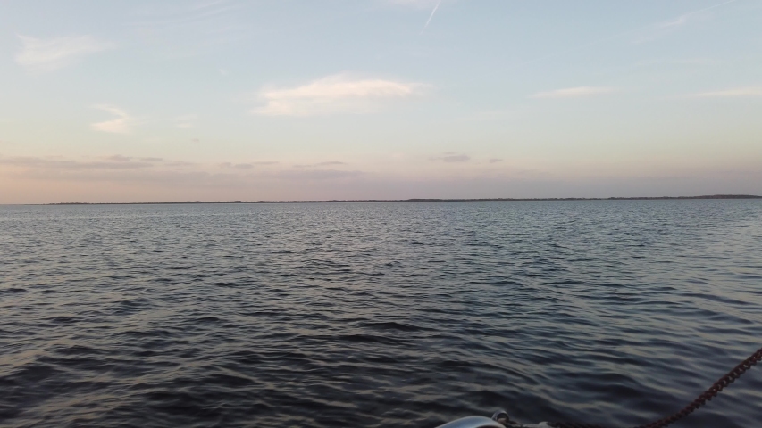 Traveling Over Ocean Water Near Florida Everglades At Sunset