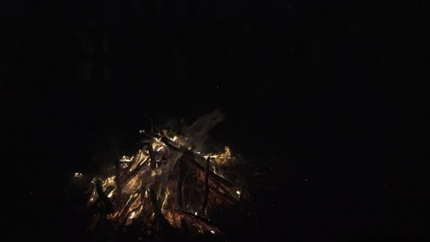 Big bonfire burns in the dark of the night