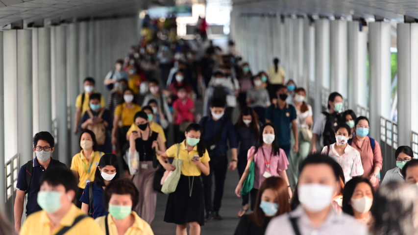 4K Time lapse crowded of city people wear face mask walking on rush hour	 | Shutterstock HD Video #1053680681