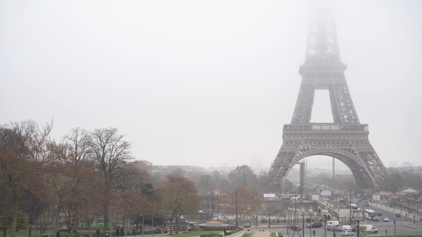 Eiffel Tower under heavy fog