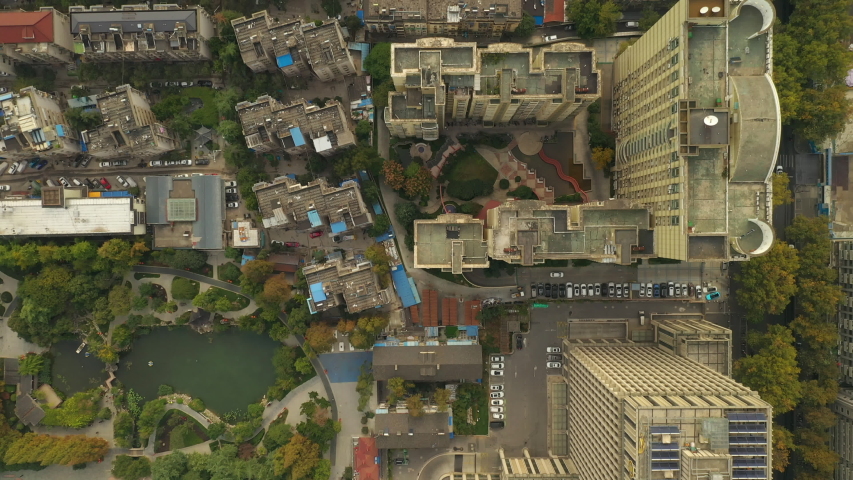 day time flight over nanjing city living complex aerial topdown panorama 4k china