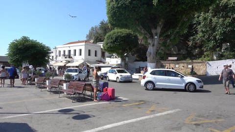 The island of Rhodes city of Lindos, a platform for arriving cars with tourists. Rhodes island Greece. September 2019