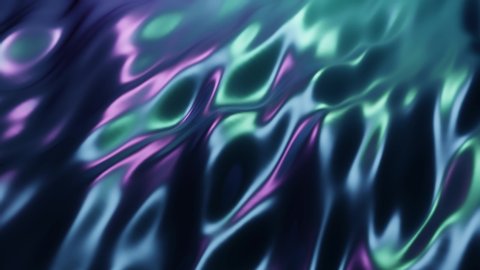 Iridescent oil slick background backdrop. Seamless looping animation. Dark blue and purple sheen. Very relaxing and calming color display waves.