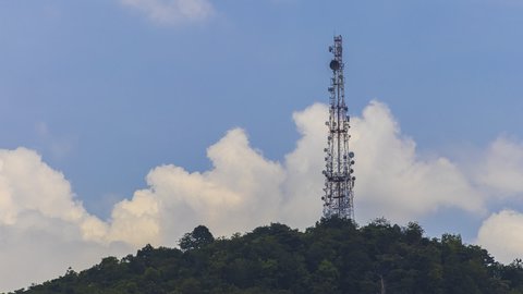 Telecommunication tower of 4G and 5G cellular. Base Station or Base Transceiver Station. Wireless Communication Antenna Transmitter. Telecommunication tower with antennas against fast clouds
