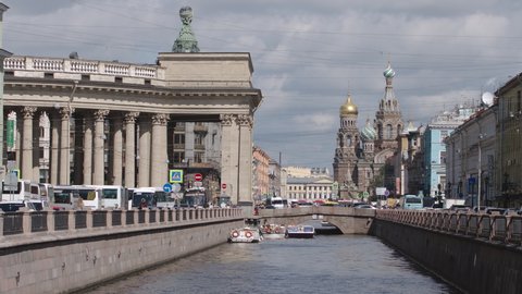 ST. PETERSBURG, RUSSIA - AUGUST 15, 2017: Famous Savior on Blood church and The Griboedov Canal in the summer
