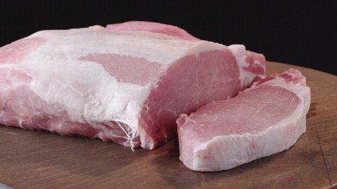 A piece of fresh pork meat for cooking steak