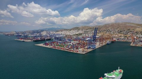 Aerial drone video of industrial loading/unloading logistics container terminal area of Perama, Piraeus port, Attica, Greece
