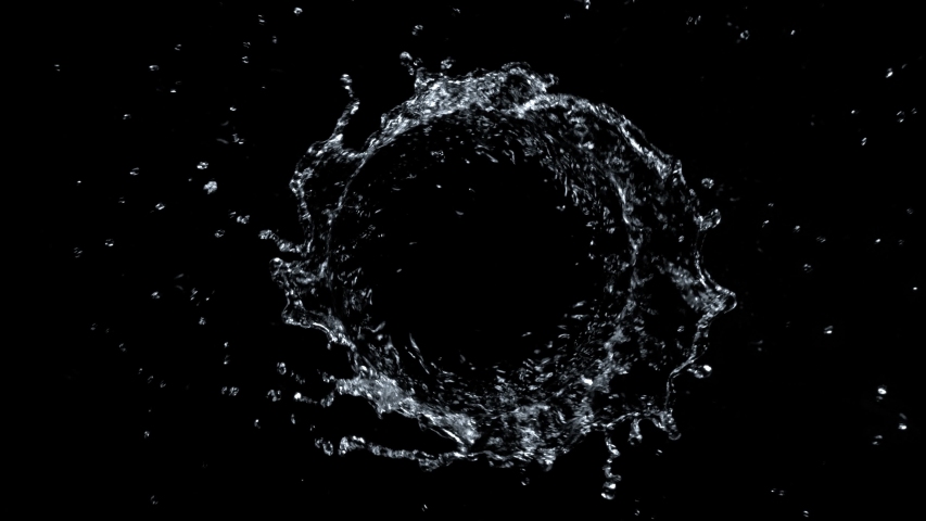 Super Slow Motion Shot of Rotating Water Splash Isolated on Black Background at 1000fps.