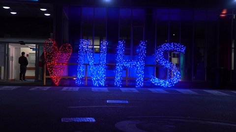 LONDON, ENGLAND - JUNE 4, 2020: Twinkling illuminated NHS Heart Sign during countrywide tour at Northwick Park Hospital - 2
