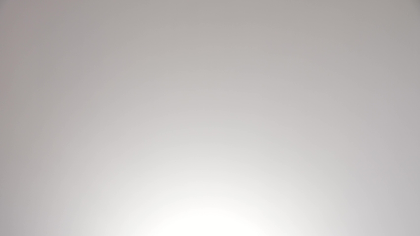 The man in the Black t-Shirt Yawns. White background
