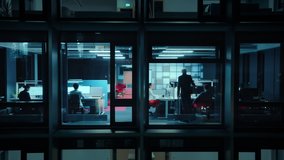 Timelapse Footage from Outside the Window: Businessmen and Businesswomen Working in the Office. Managers Doing Financial Tasks and Errands. Employees Work on Computers, Mobile Phones, Tablets. - Powered by Shutterstock - Get 15% off with code: PIKWIZARD15