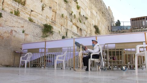 Jewsih Prayer with mask at Western Wall-Coronavirus Lockdown
Jerusalem/Israel, March/15-2020
