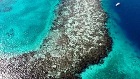 aerial view of Belize barrier coral reef with Blue hole.