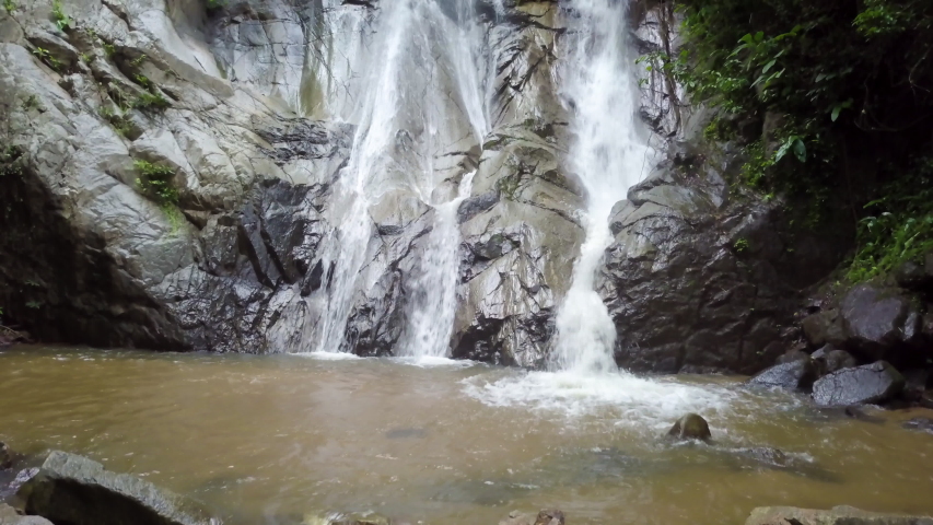 Magical Aerial shot of Waterfall in Northern Thailand, Slow Rise Up