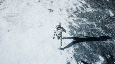 The astronaut is walking on a new unknown snow planet under alien stars. Animation for fantasy, futuristic or space travel backgrounds.