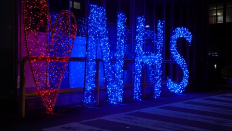 LONDON, ENGLAND - JUNE 4, 2020: Twinkling illuminated NHS Heart Sign during countrywide tour at Northwick Park Hospital 