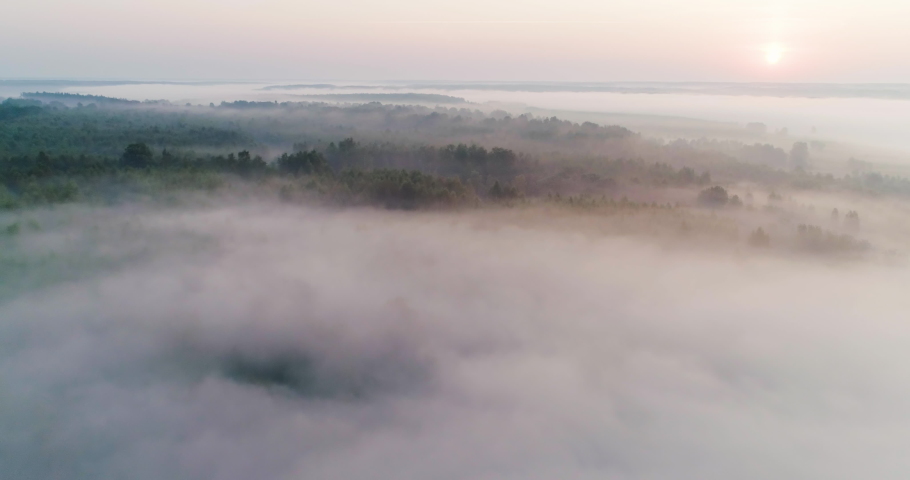sunrise on the river, 4K aerial view of morning mist at sunrise, morning mist on the river,  Aerial view of mystical river at sunrise with fog