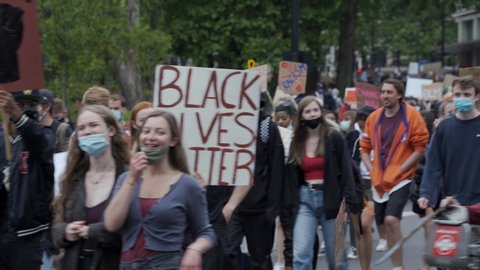 UK, London, 3/6/2020 - Hundreds of multicultural Black lives Matter protesters marching down Park Lane in London