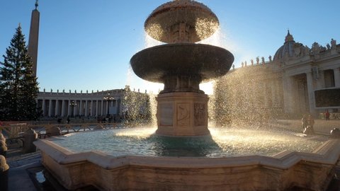 Silhouette of the fountain on the Saint Peter square outside the vatican at sunset. 4k