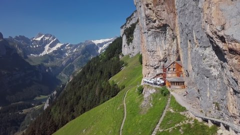 Flight around of chalet in the rock on Ebenalp, Canton of Appenzell, Switzerland