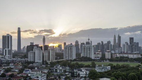 4k time lapse of dramatic sunset at Kuala Lumpur city horizon. Zoom in
