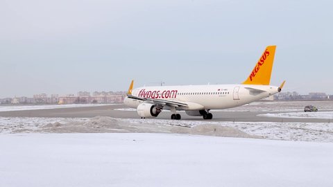 Pegasus airline company plane in Kharkov airport. Airbus A320 Neo at the airport waiting for their flight. Airplane belonging to Turkish Pegasus Airlines. Boeing 737-800. Kharkov, Ukraine, 16.02.2020