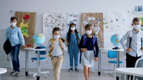 Group of children with face mask back at school after covid-19 quarantine and lockdown. - Powered by Shutterstock - Get 15% off with code: PIKWIZARD15