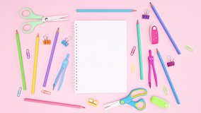 6k Pastel colored school supplies appear around notebook - Back to school stop motion  - Powered by Shutterstock - Get 15% off with code: PIKWIZARD15