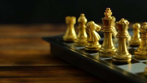 Close up shot golden and silver chess on chess board game select focus shallow depth of field