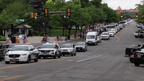 Ogden, Utah / United States - June 6 2020: Ogden City says goodbye to fallen heroic officer Nate Lyday as a mile long procession and the community say goodbye with no audio