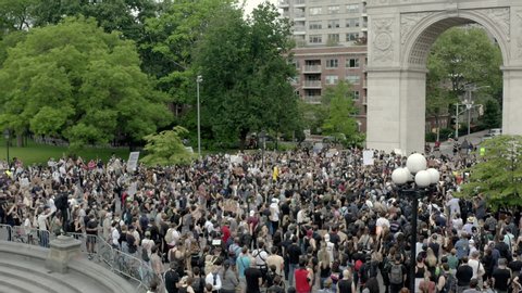 NEW YORK - JUNE 5, 2020: huge crowd in Washington Square Park protest police killing of George Floyd, demonstration in Manhattan New York City NYC.