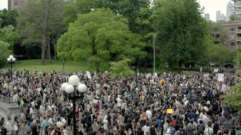 NEW YORK - JUNE 5, 2020: Black Lives Matter activists crowd into Washington Square Park to protest police killing of George Floyd, demonstration in Manhattan New York City NYC.