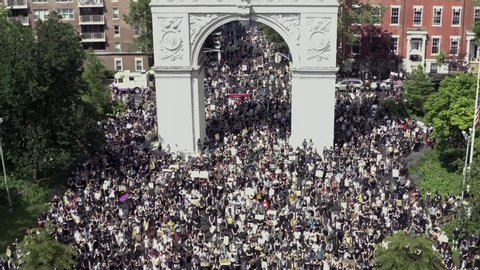 NEW YORK - JUNE 6, 2020: Washington Square Park filled to capacity with protestors activists Black Lives Matter allies with signs protesting the police killing of George Floyd, demonstration in NYC.